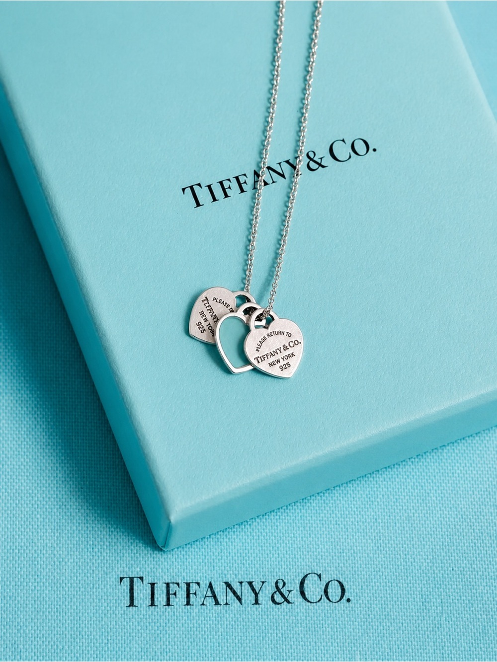 Authentic Tiffany & Co Three Mini Heart Tag Necklace.
